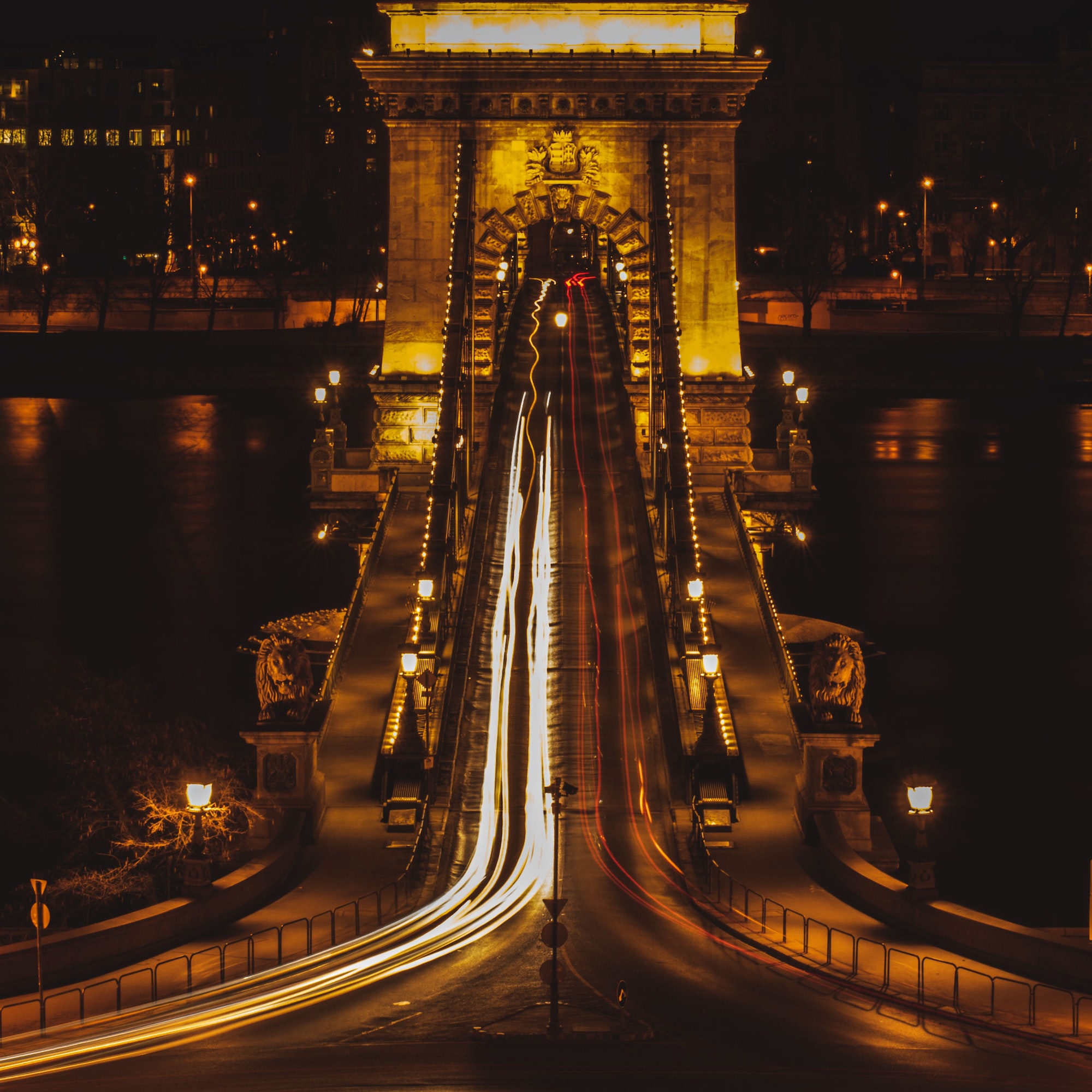 Long exposure shot of the illuminated bridge in Budapest at night